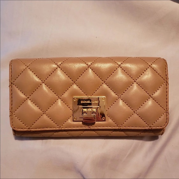 Michael Kors Handbags - Michael Kors Blush Gold Emblem Quilted Wallet